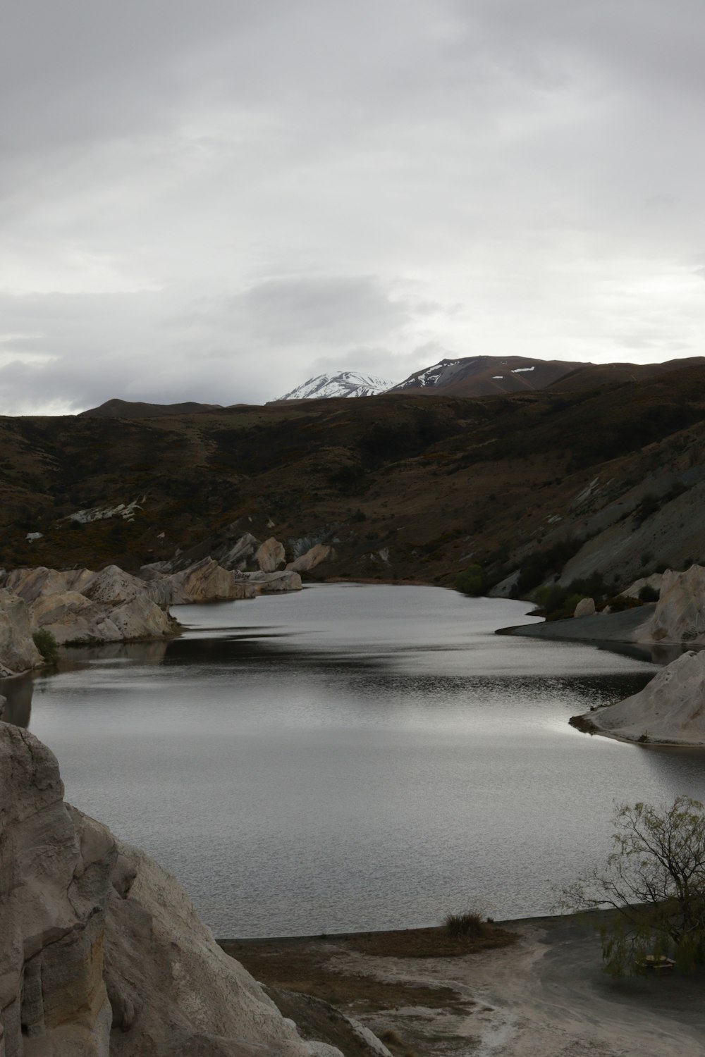 a large body of water surrounded by mountains