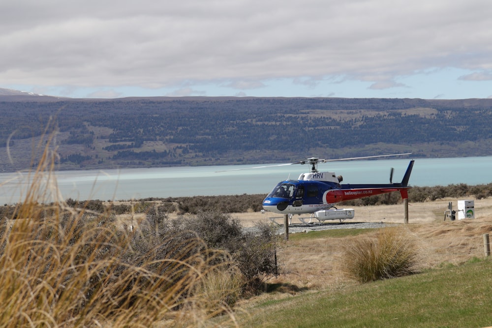 a helicopter is parked on the side of the road