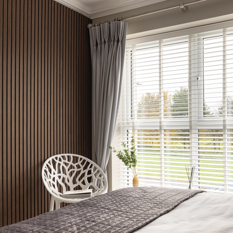 Accoustic wall pannelling in a bedroom setting