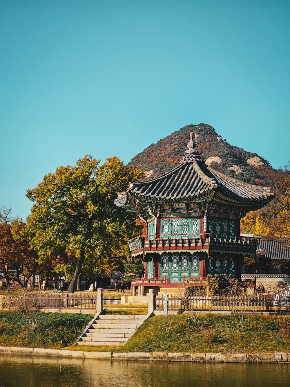 a pagoda in the middle of a lake