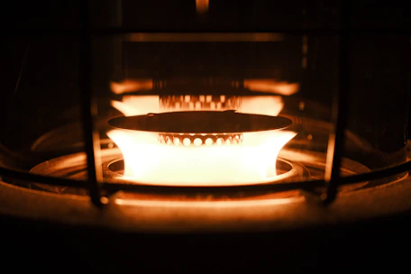 Close-up of advanced methanol fuel cells glowing softly in a high-tech lab setting.