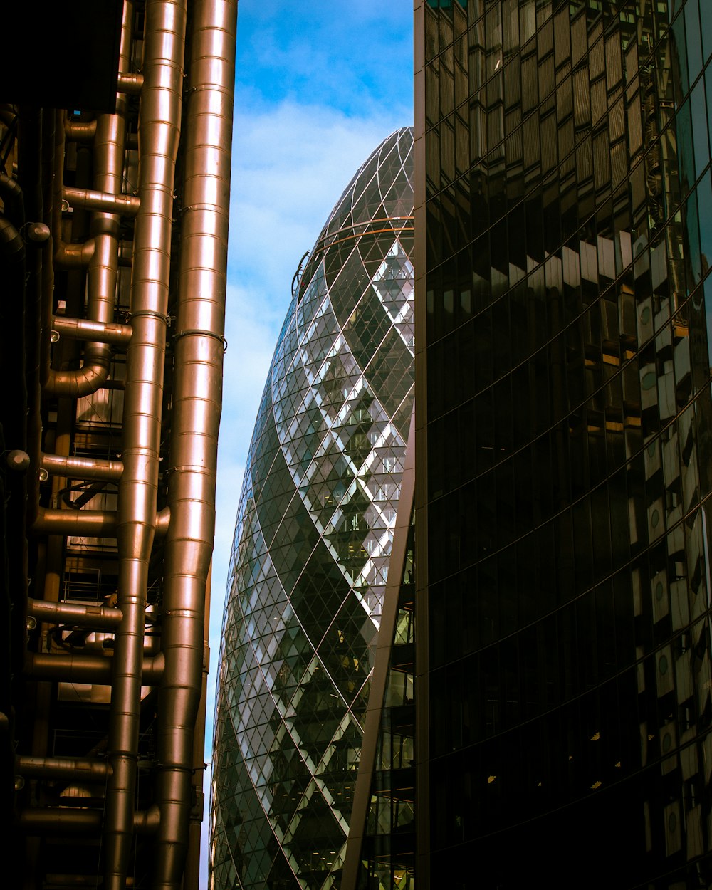 a very tall building next to a very tall building