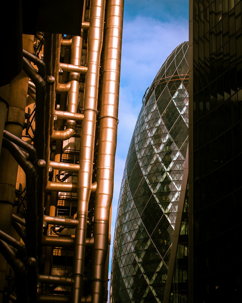 a very tall building next to a very tall building