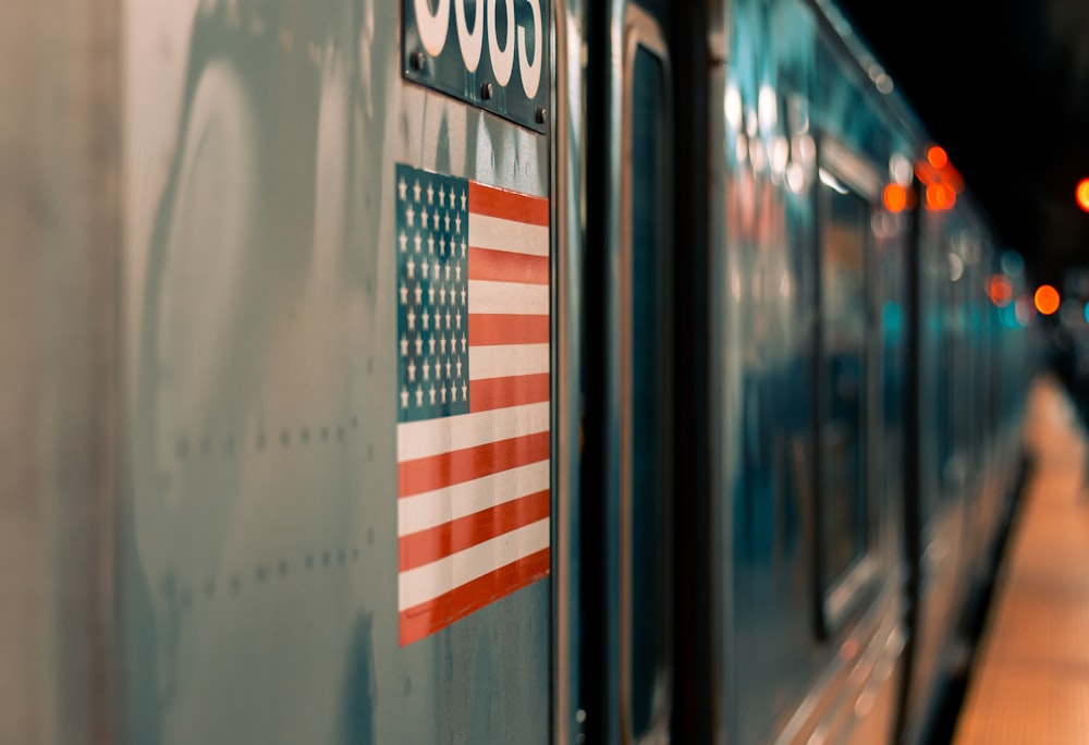 a train with an american flag on the side of it