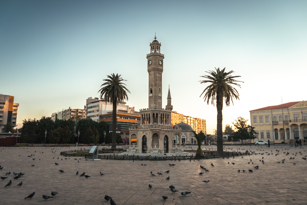 a large clock tower towering over a city