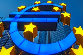 a blue and yellow sign with stars on it