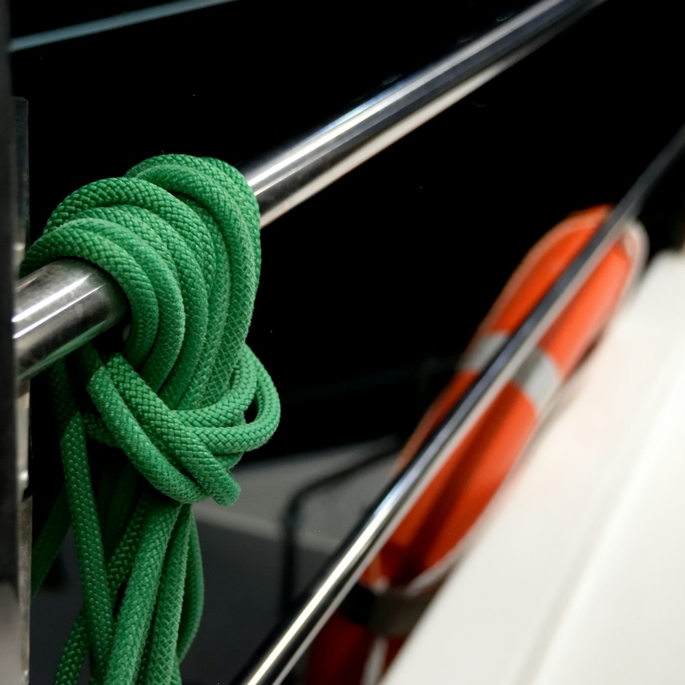 a close up of a green rope on a boat