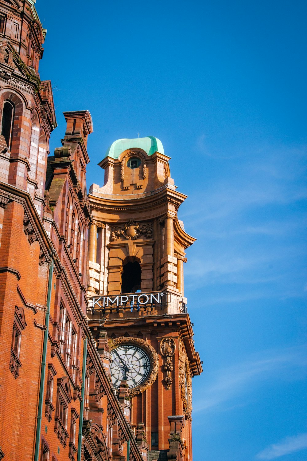 a large building with a clock on the front of it