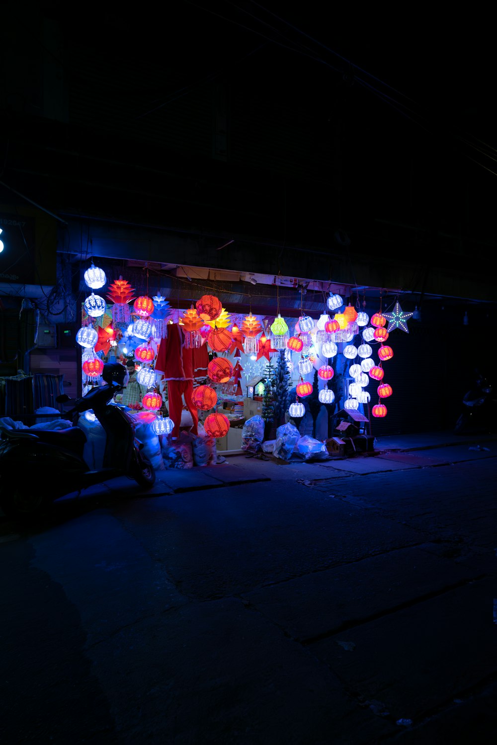 a store with a lot of lights on the front of it