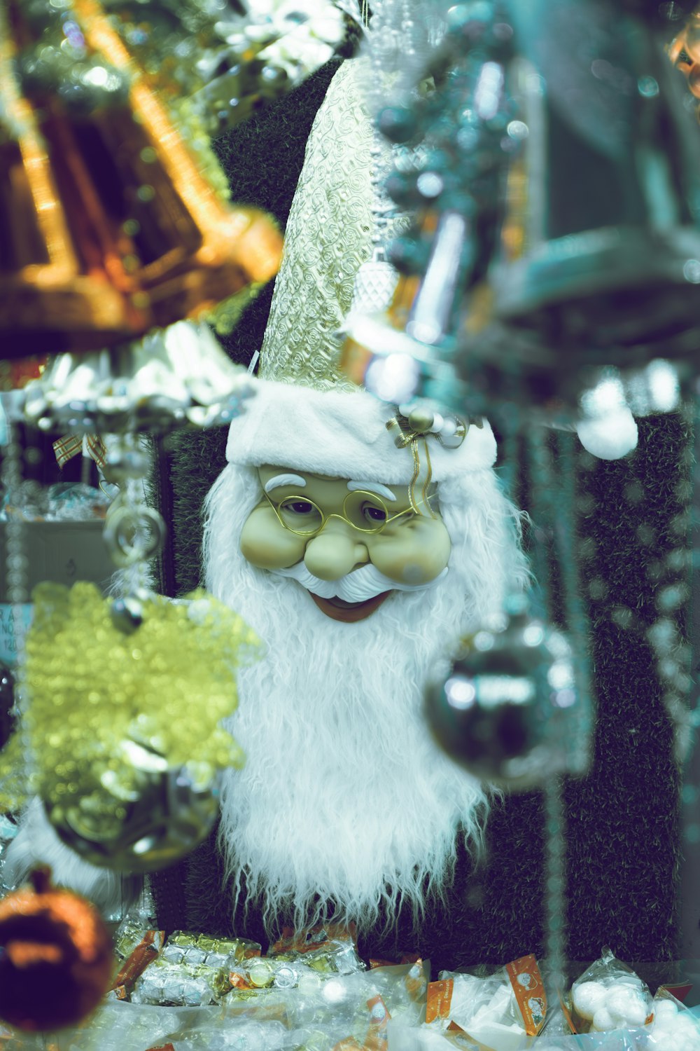 a close up of a santa clause ornament