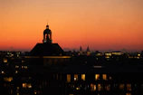 Wide-angle shot of Sofia city skyline at dusk, symbolizing our Bulgarian roots.