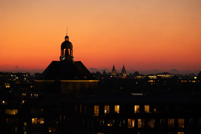 Wide-angle shot of Sofia city skyline at dusk, symbolizing our Bulgarian roots.