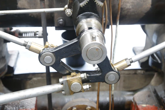 Close-up of a precision-engineered industrial pump component in a clean workshop environment.