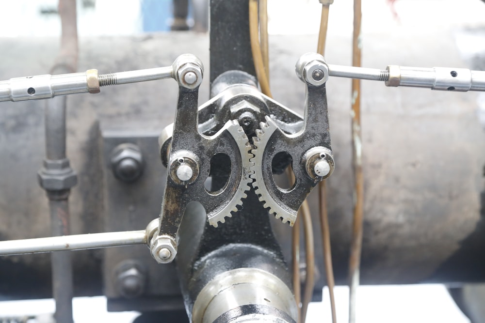 a close up view of a machine with gears