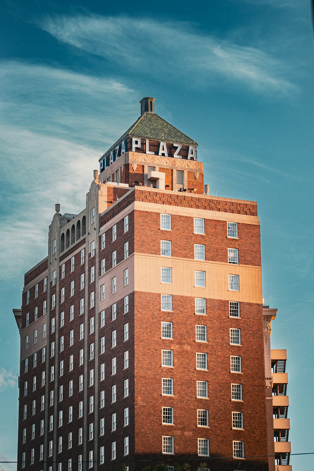 a tall building with a clock on the top of it