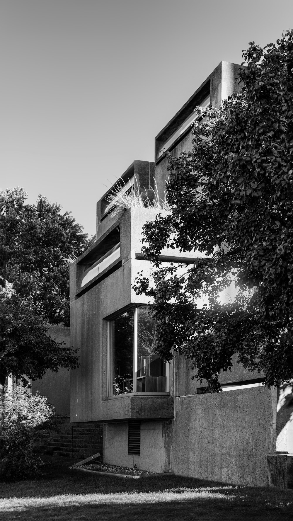 a black and white photo of a house