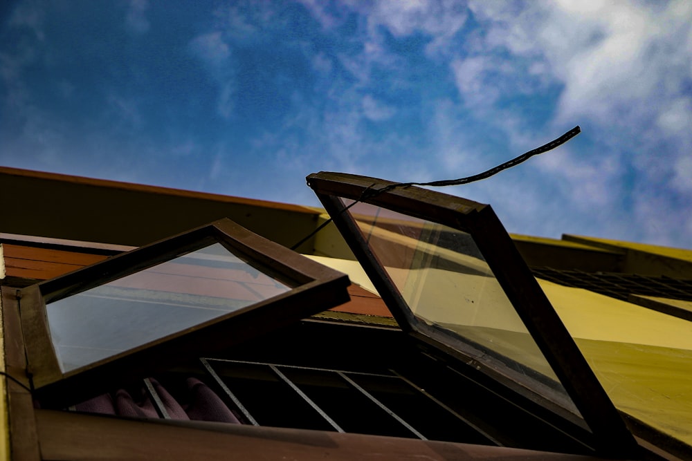 a picture of a building with a sky in the background