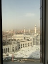 View from the deluxe room window showing the bustling streets of Makkah.