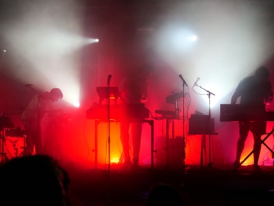 a group of people that are standing on a stage