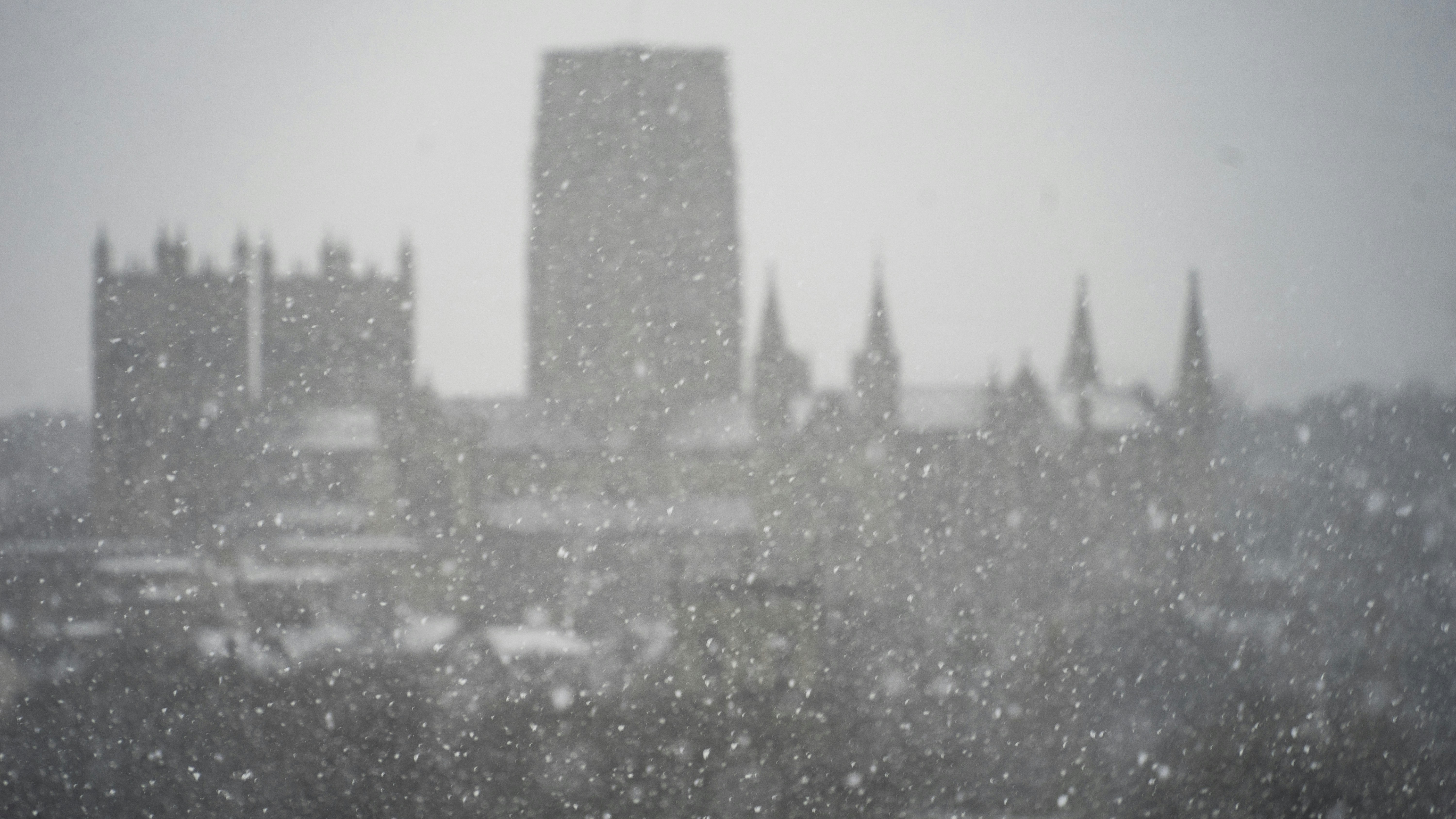 a view of a city in the snow