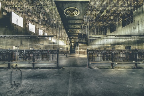 a very large building with a bunch of metal railings