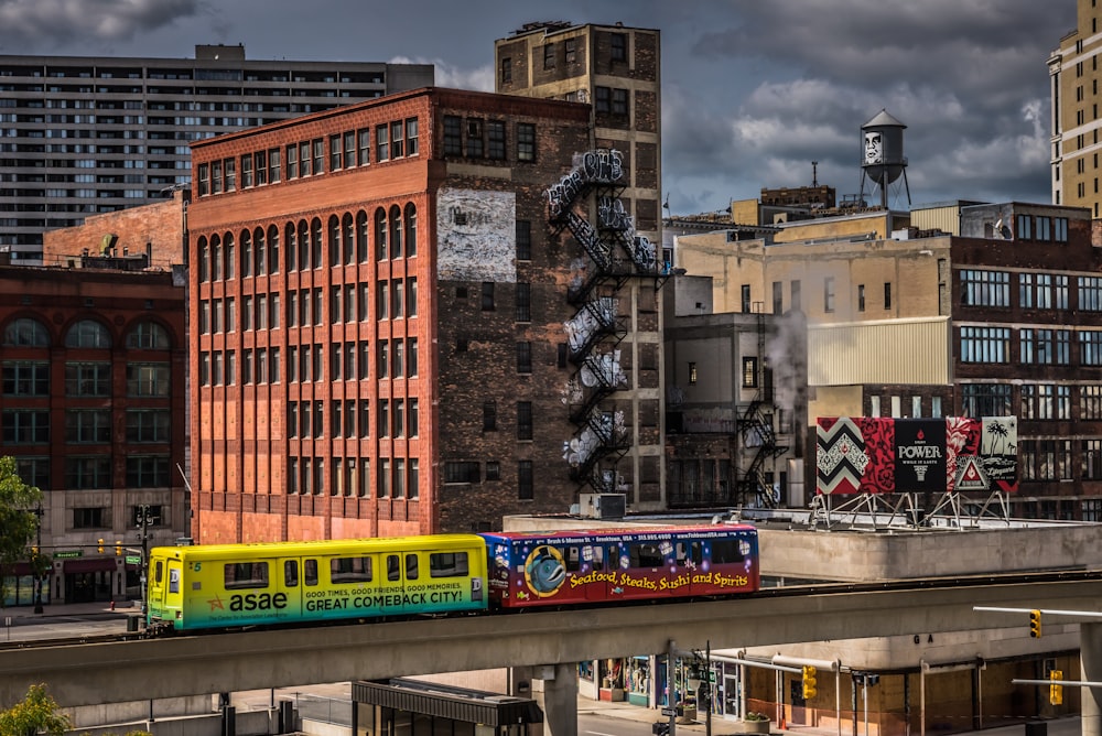 a train on a train track in a city