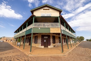 A photo showcasing the exterior of the club building.
