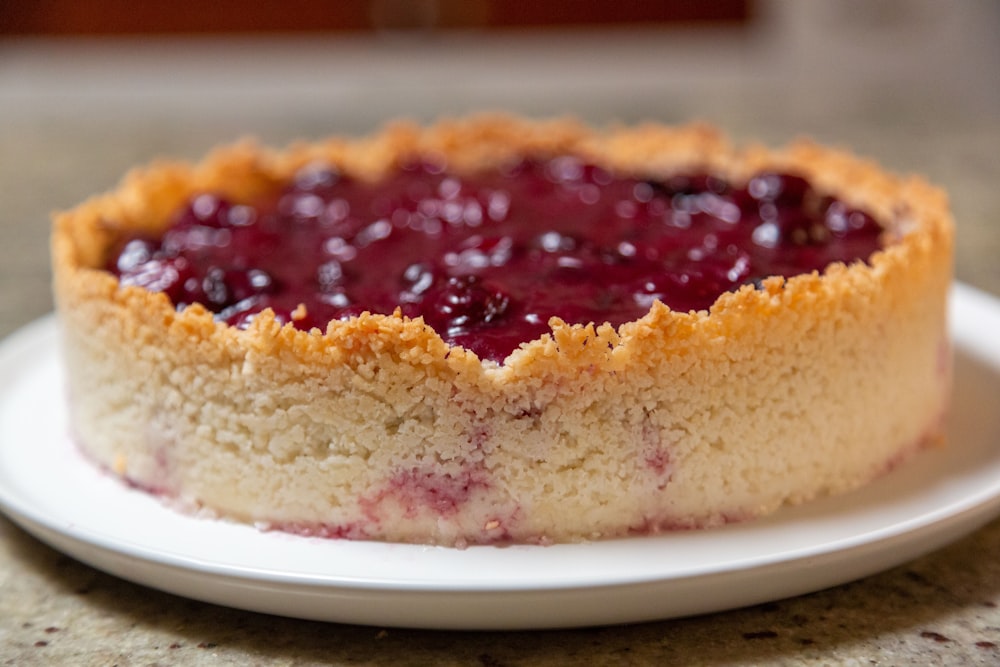 a close up of a cake on a plate on a table