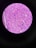 A circular microscopic view showing a tissue sample, characterized by a complex pattern of cell structures in various shades of purple and pink against a dark background.