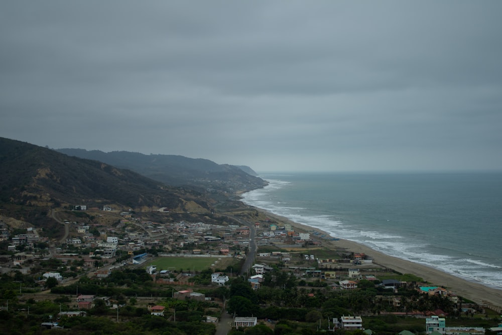 a view of a beach from a hill