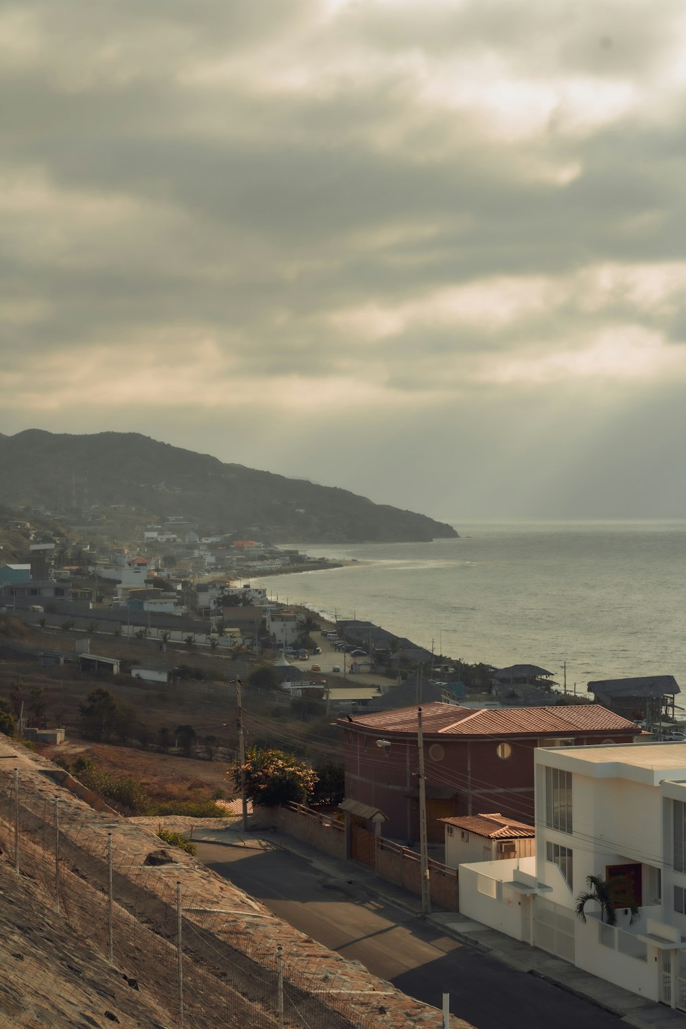 a view of the ocean from a hill