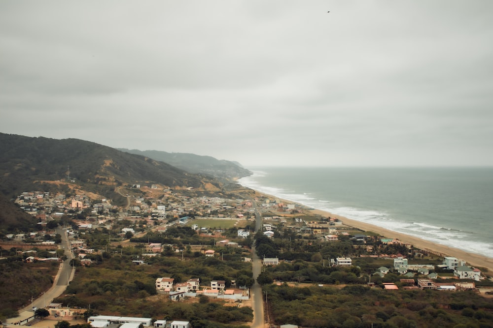 an aerial view of a town on the beach