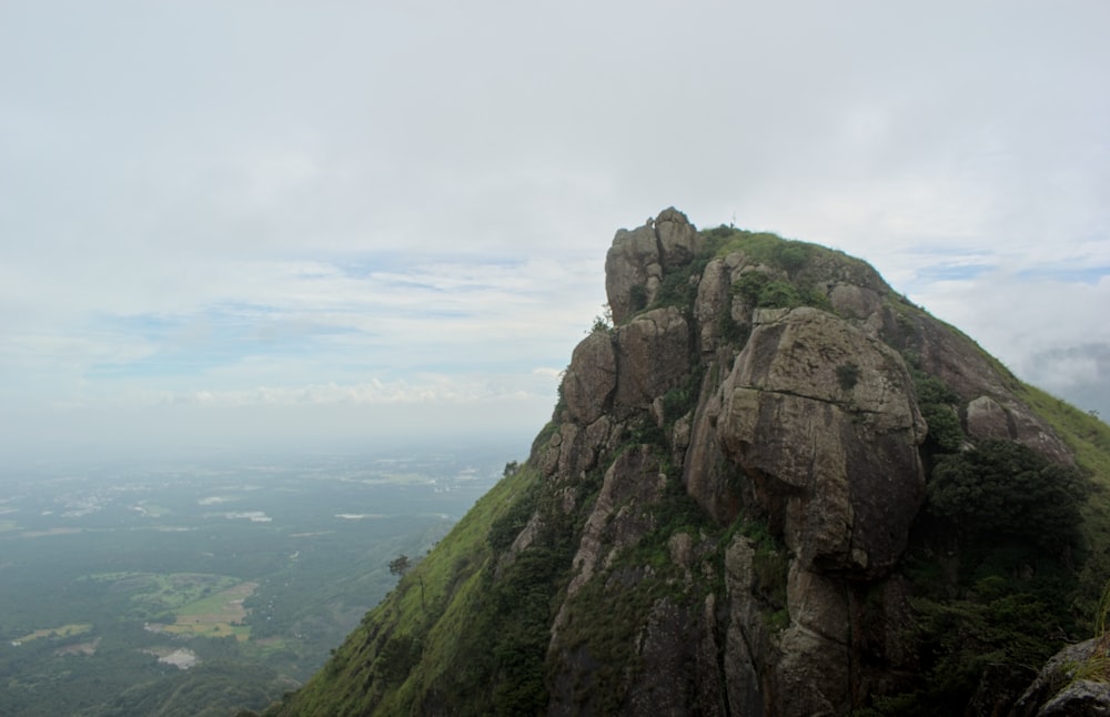 a large rock formation on top of a mountain