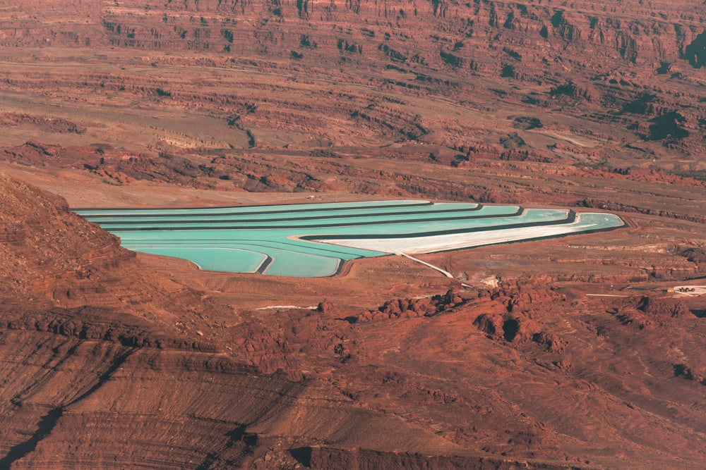 a large pool in the middle of a desert