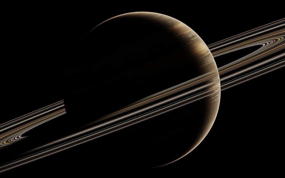 saturn with its rings in the dark sky