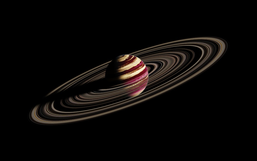 a red and white striped apple sitting on top of a black background