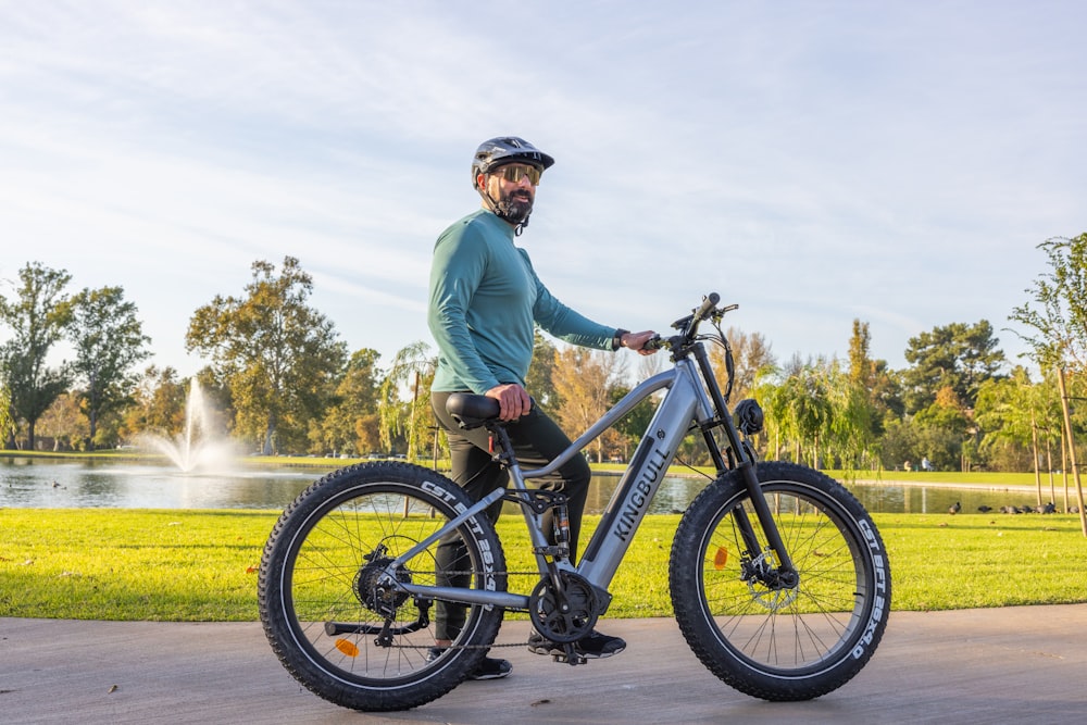 a man in a helmet is riding a bike