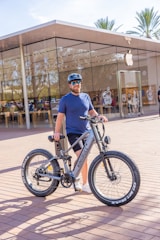 A customer happily choosing biking gear at a Procter Store online shopping interface.