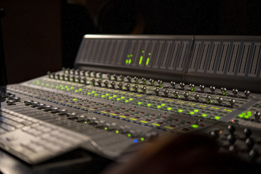 a sound mixing console in a recording studio