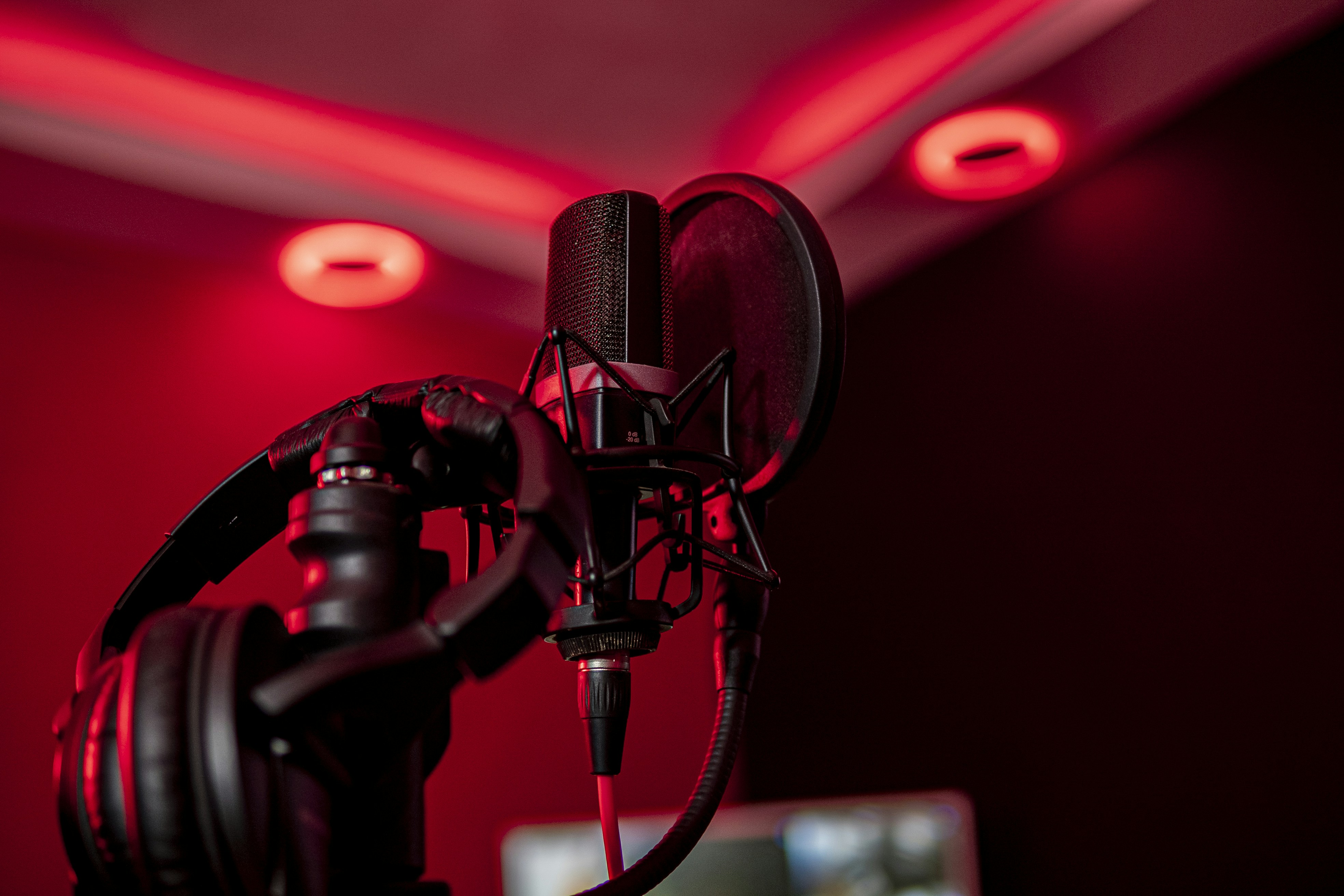 a microphone and headphones in a dark room