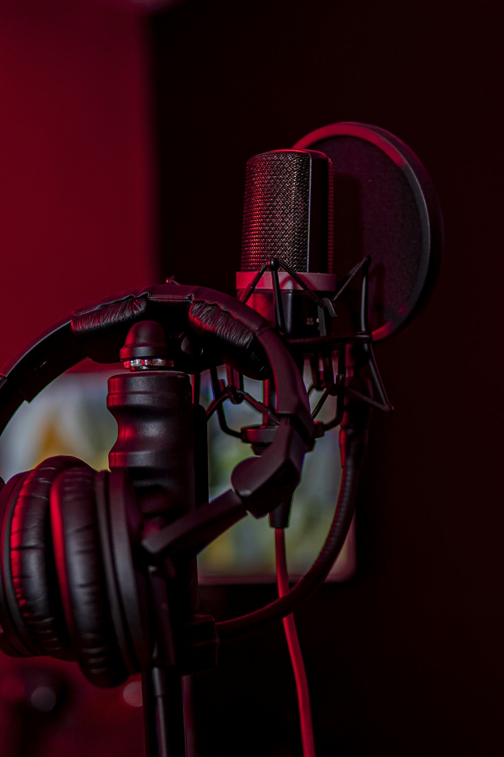 a microphone and headphones in a dark room