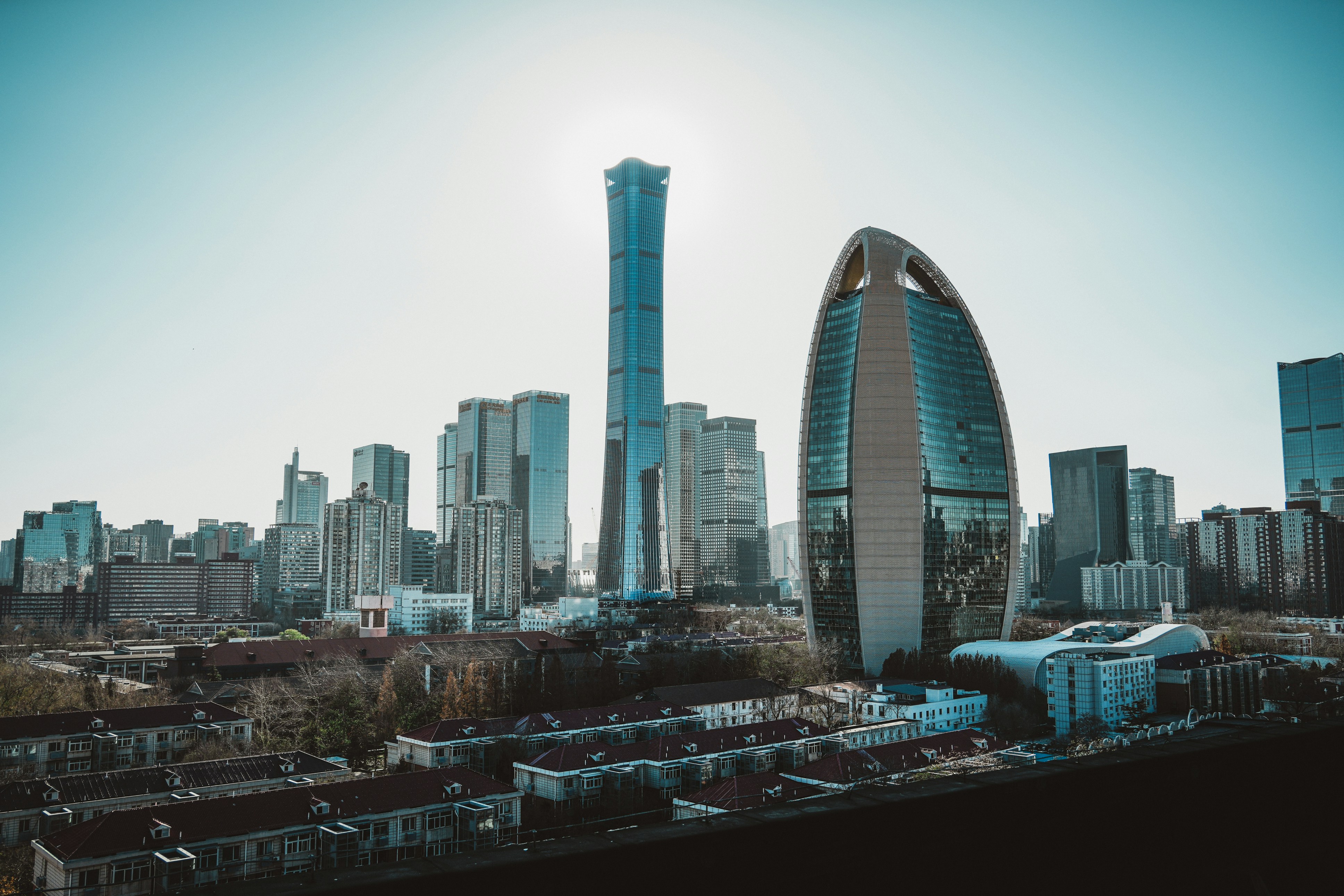 a very tall building in the middle of a city