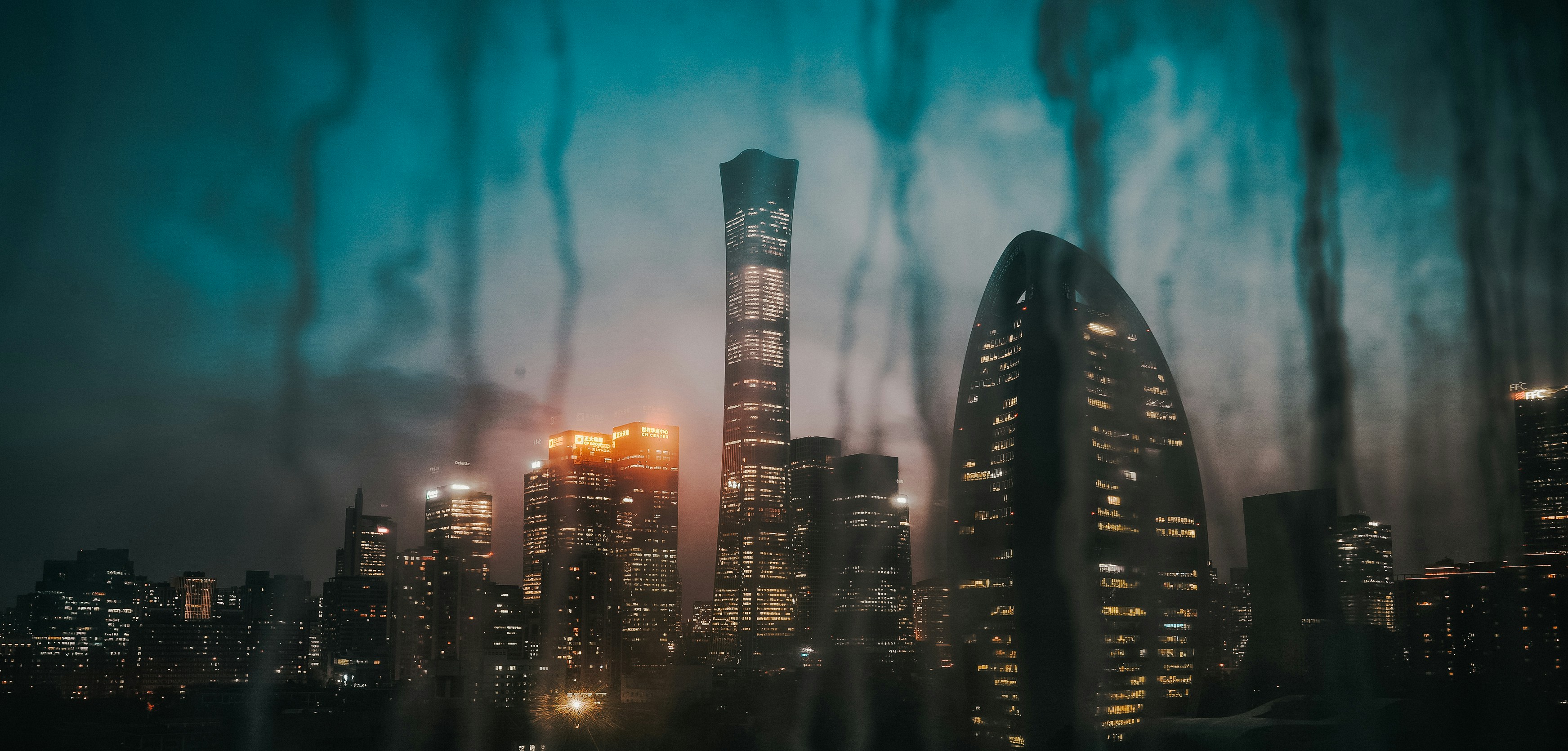 a view of a city at night from a window