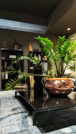 A sleek LED coffee table glowing softly in a modern living room.