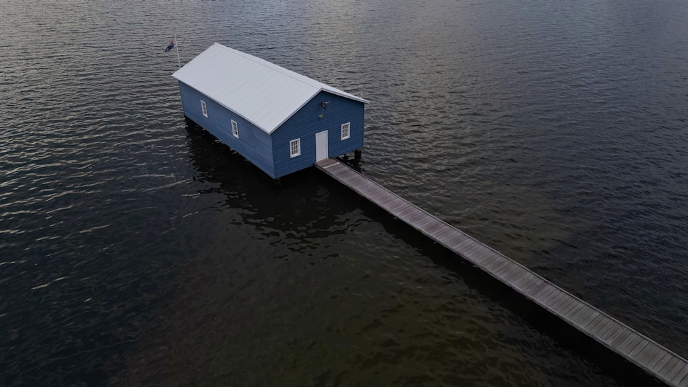 a house floating on top of a body of water