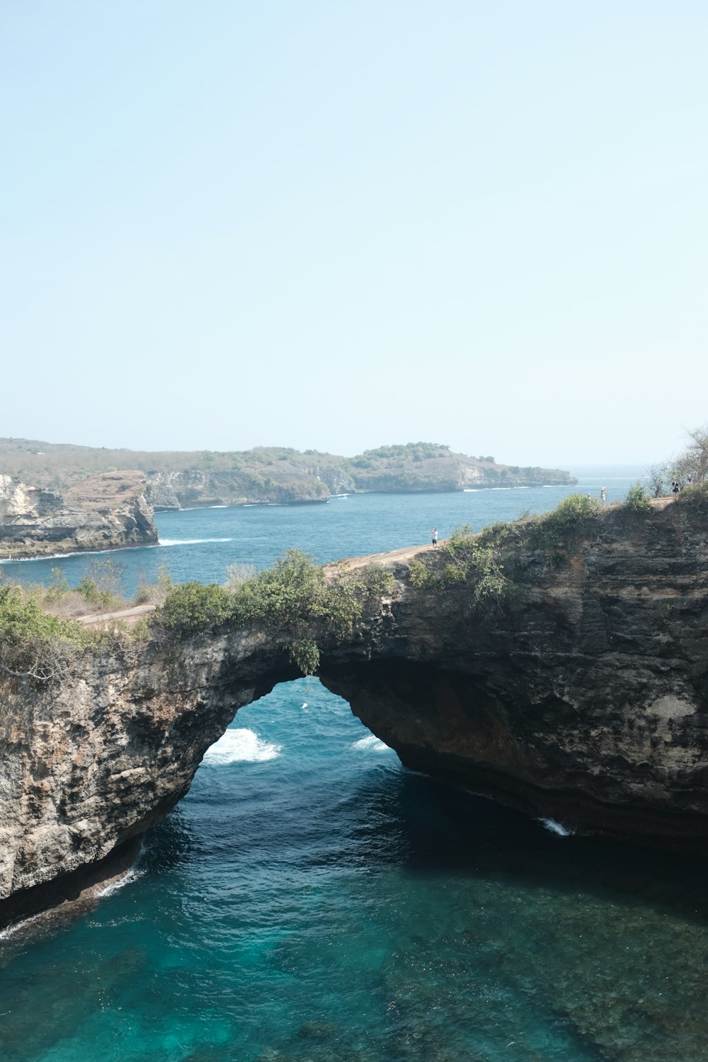 a view of the ocean from a cliff