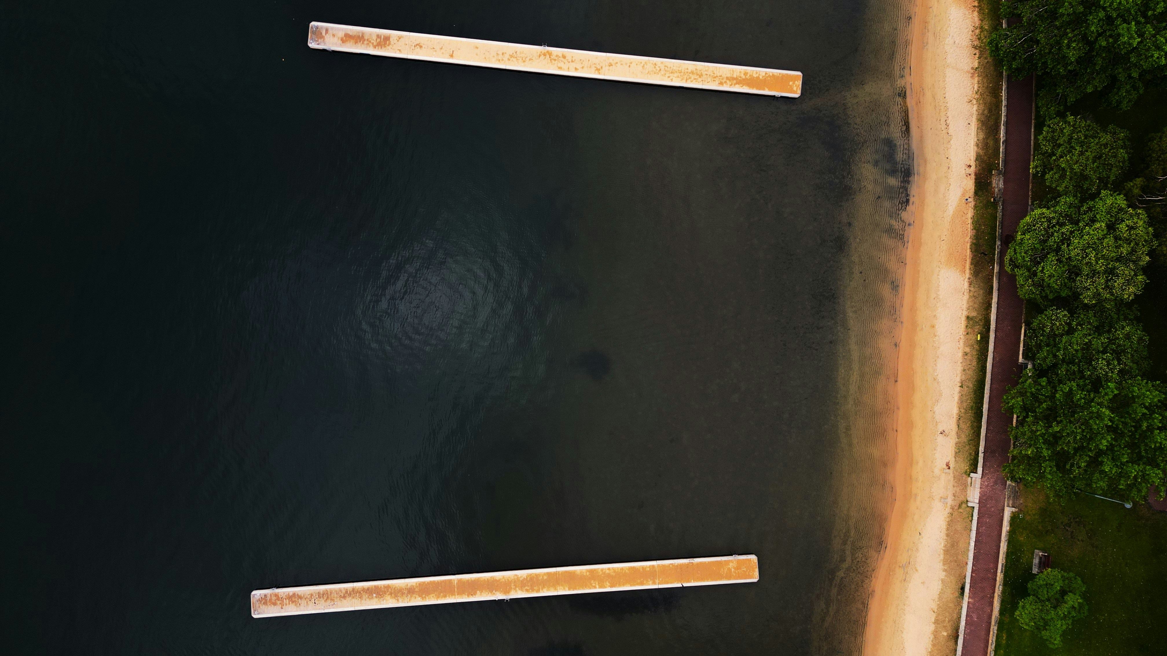 A stack of corrugated boards showing visible signs of warp and curl.