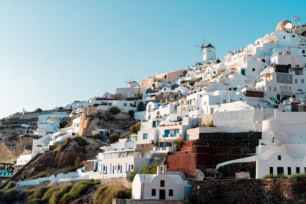 a very tall white building on a hill