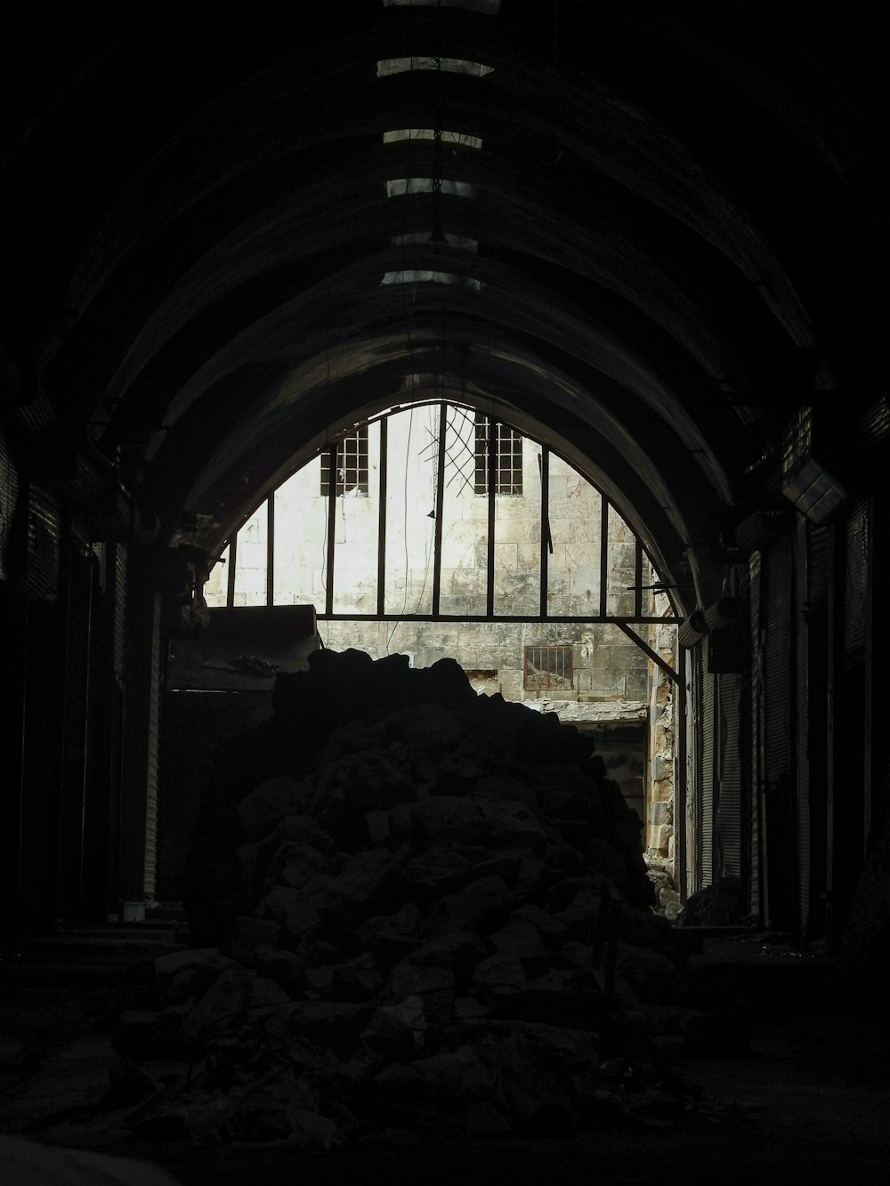 a large pile of rocks in a dark room