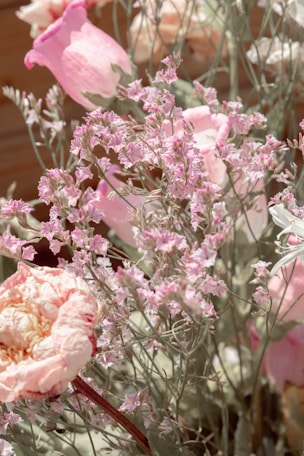 a bunch of flowers that are in a vase